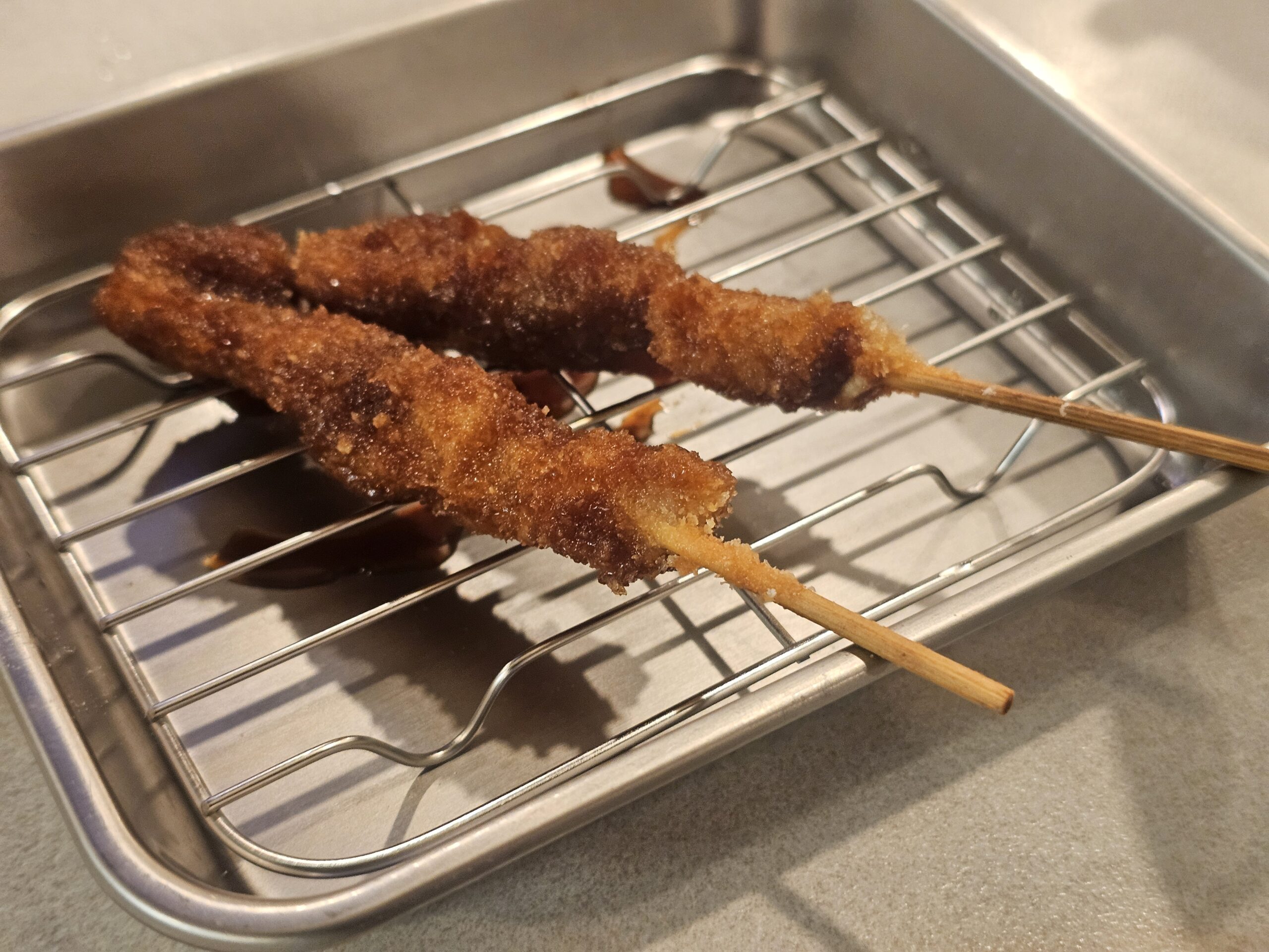 無限ニンニクホルモン串